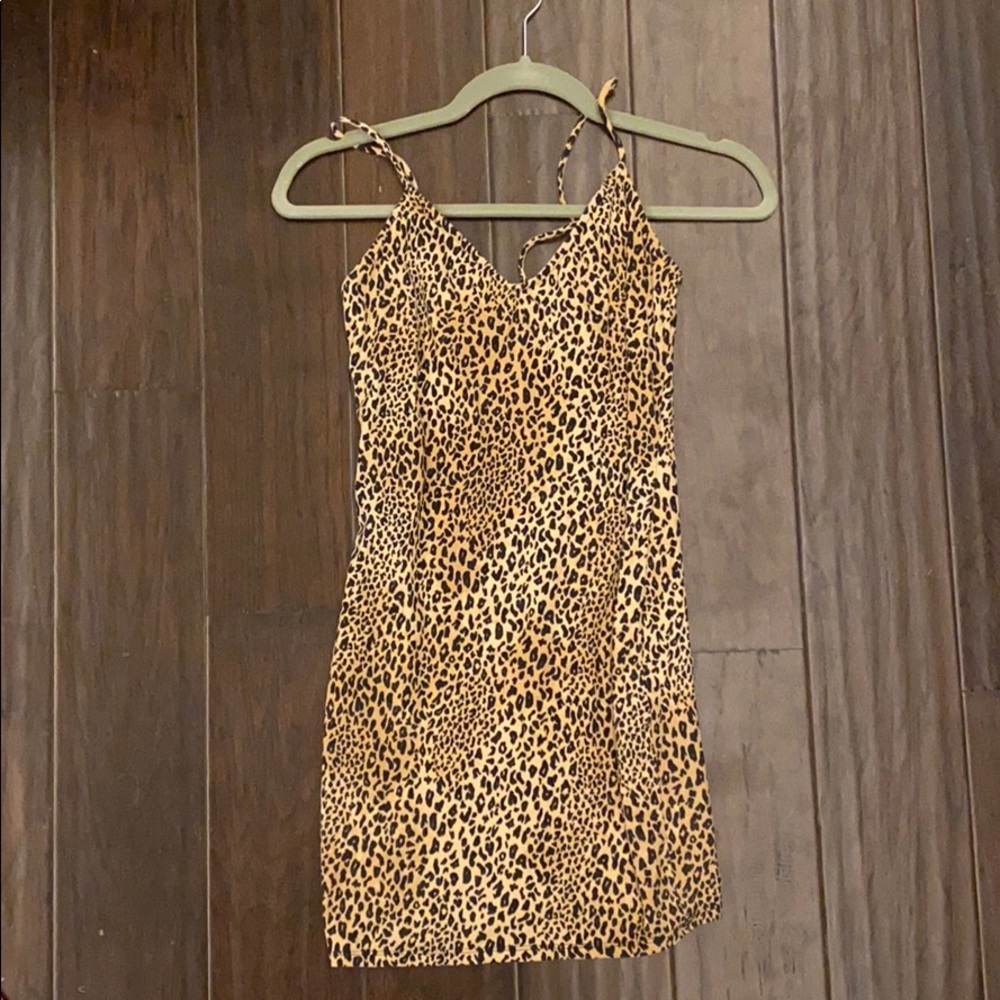 Sketchy form fitting Cheetah Dress